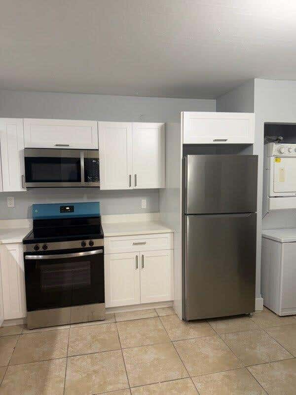 Photo of 4839 Arjaro Drive #4839, West Palm Beach, FL 33407 (MLS # B26055800)