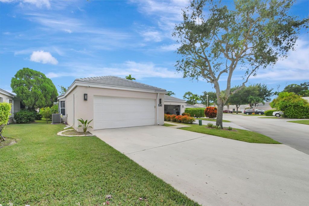 Photo of 1069 Island Manor Drive, Greenacres, FL 33413 (MLS # R11007766)