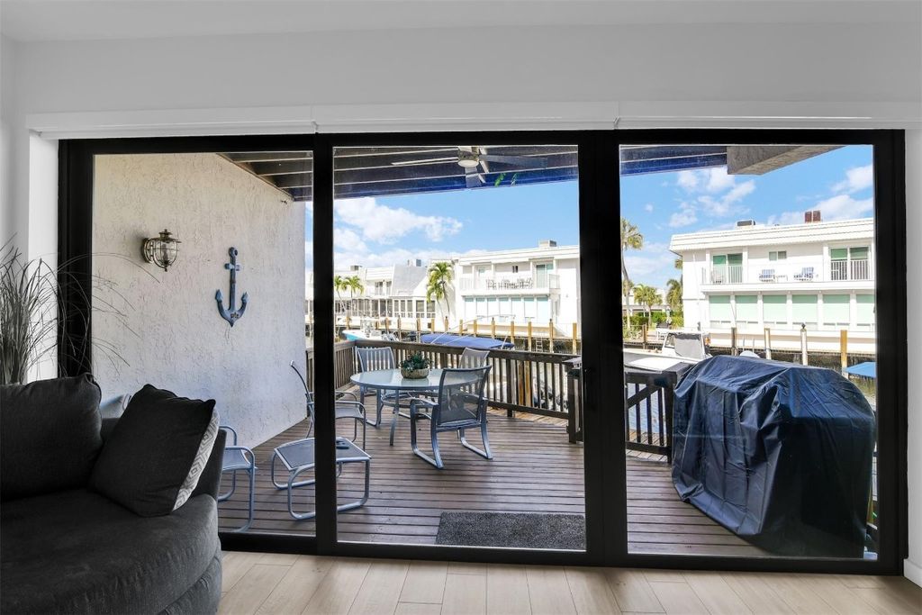 Photo of 1035 Boca Cove Lane, Highland Beach, FL 33487 (MLS # F10543212)