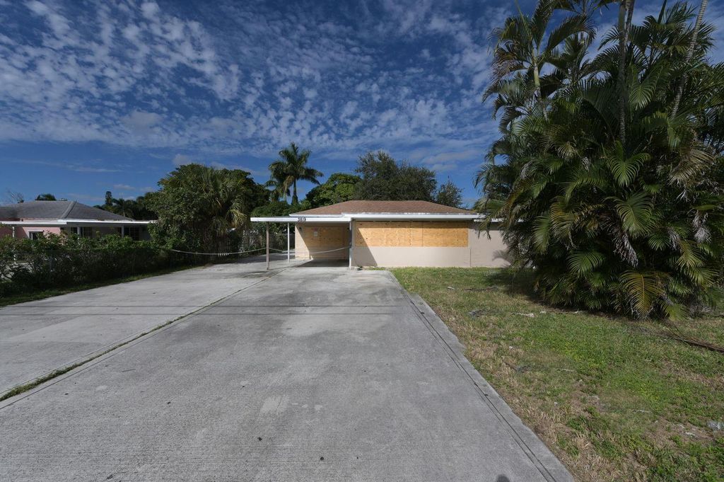 Photo of 3819 Lakewood Road, Palm Springs, FL 33461 (MLS # R10794090)