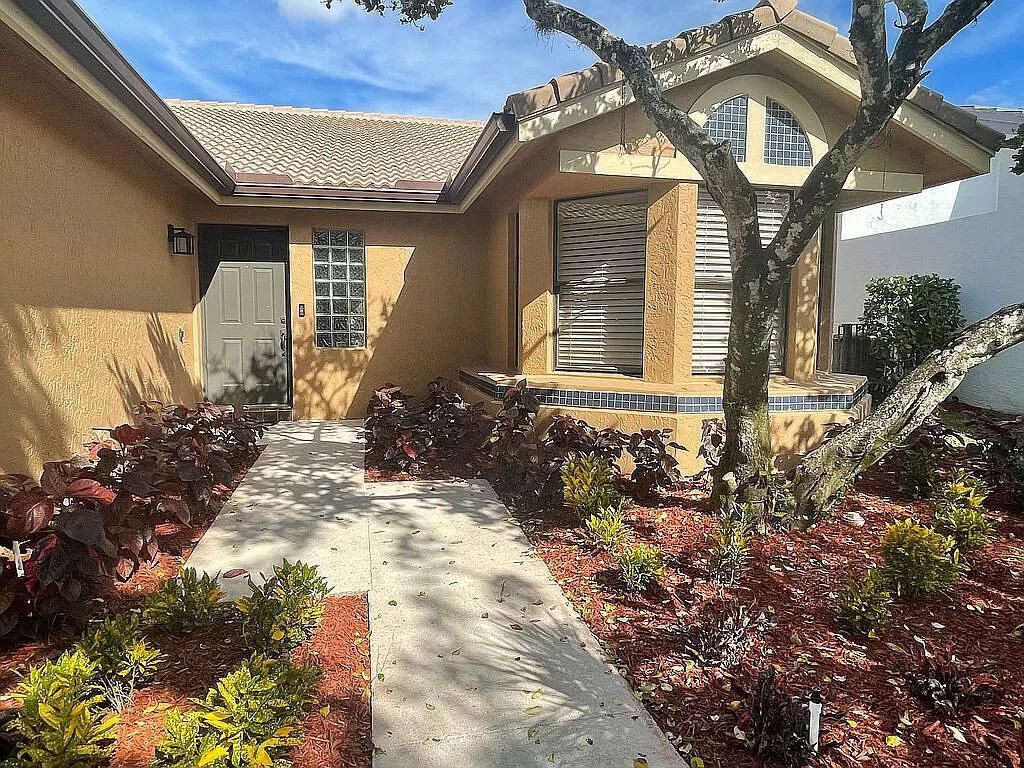 Photo of 10613 Santa Laguna Drive, Boca Raton, FL 33428 (MLS # B26007867)