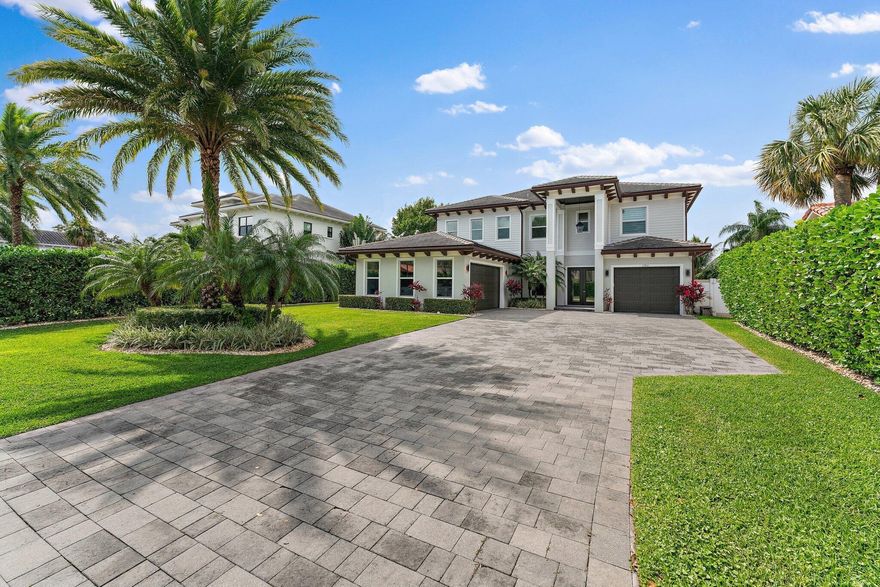 Move right into this stunning 2018 waterfront home in the heart of Palm Beach Gardens - with no HOA. Featuring 6 bedrooms, 4.5 baths, and 4,271 sq ft, this home offers luxury finishes throughout, including a glass staircase, custom closets, epoxy garage floors, and an electric fireplace.You'll love relaxing at the resort-style heated pool, built-in grill and tiki hut with a waterfall feature. The protected canal is a ''hurricane hole'' with new seawall, Trex decking, and a 16,000 lb boat lift.Upstairs, the spacious master suite has a private patio, oversized bathroom, and dual walk-in closets. This home is move-in ready and built for both comfort and entertaining.  True Florida living!  Optional fully furnished as well.