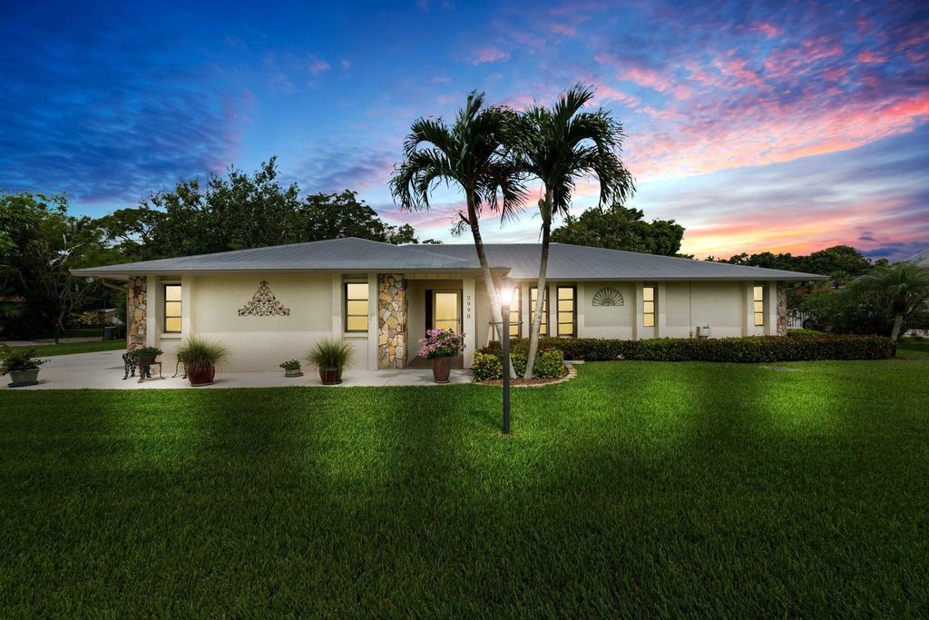 Photo of 2998 SE Farley Road, Port St Lucie, FL 34952 (MLS # R10895045)