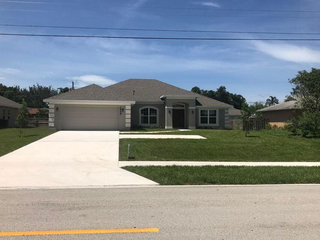 Photo of 2617 SW Harem Circle, Port St Lucie, FL 34953 (MLS # R10863957)