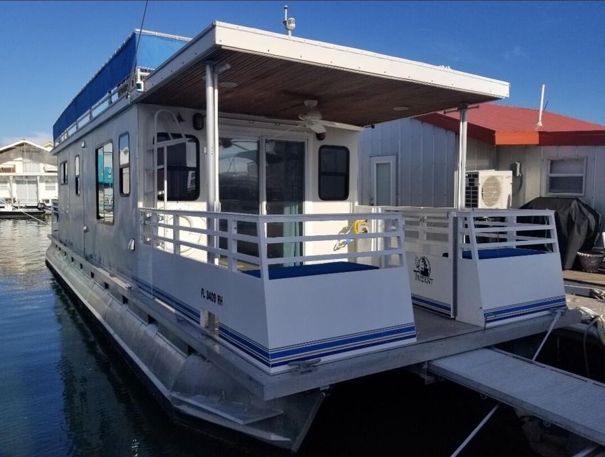 Very well maintained 2017 Trident 45' Houseboat being conveyed with a leasehold slip at City's Garrison Bight Marina.