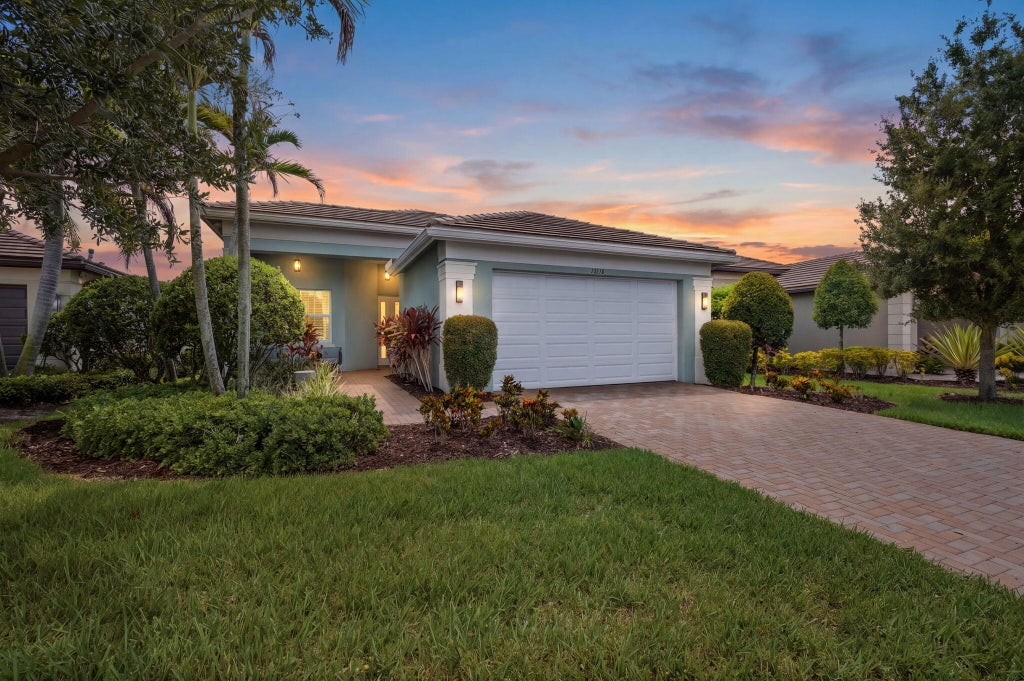 Photo of 10718 SW Matisse Lane, Port Saint Lucie, FL 34987 (MLS # B26072403)