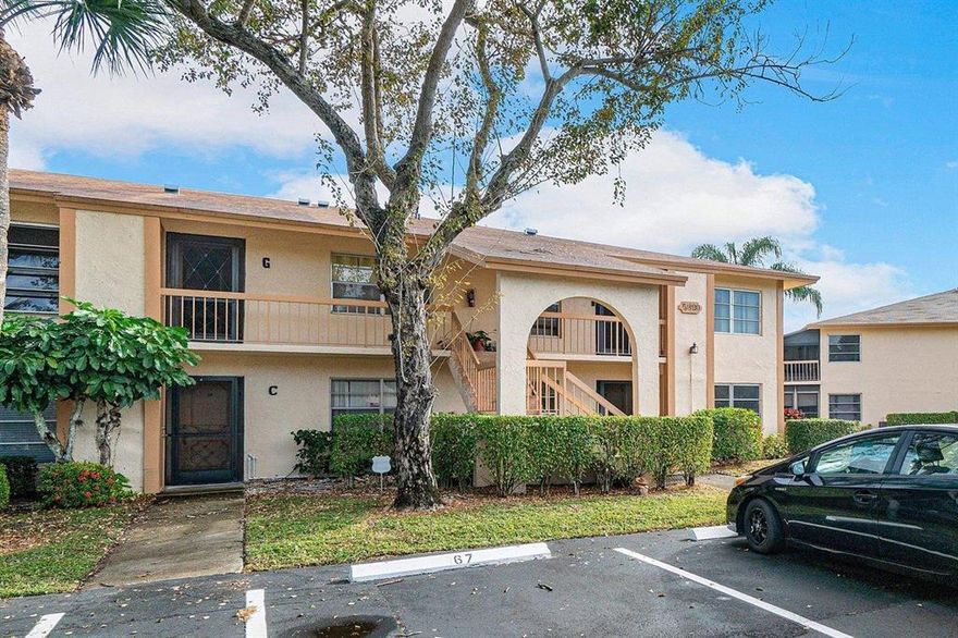 Seller Motivated! Bring reasonable offers.  Amazing furnished waterfront condo!  This two bed and two bath condo has beautiful water views that can be enjoyed from the screened in patio.  The AC was replaced in 2019.  This home has beautiful hard wood floors and newer carpets.  The kitchen has granite counter tops with an eat in kitchen.  Palm Greens is an active 55+ community that has something for everyone.  The development is just minutes from shops, 95, the turnpike and more.