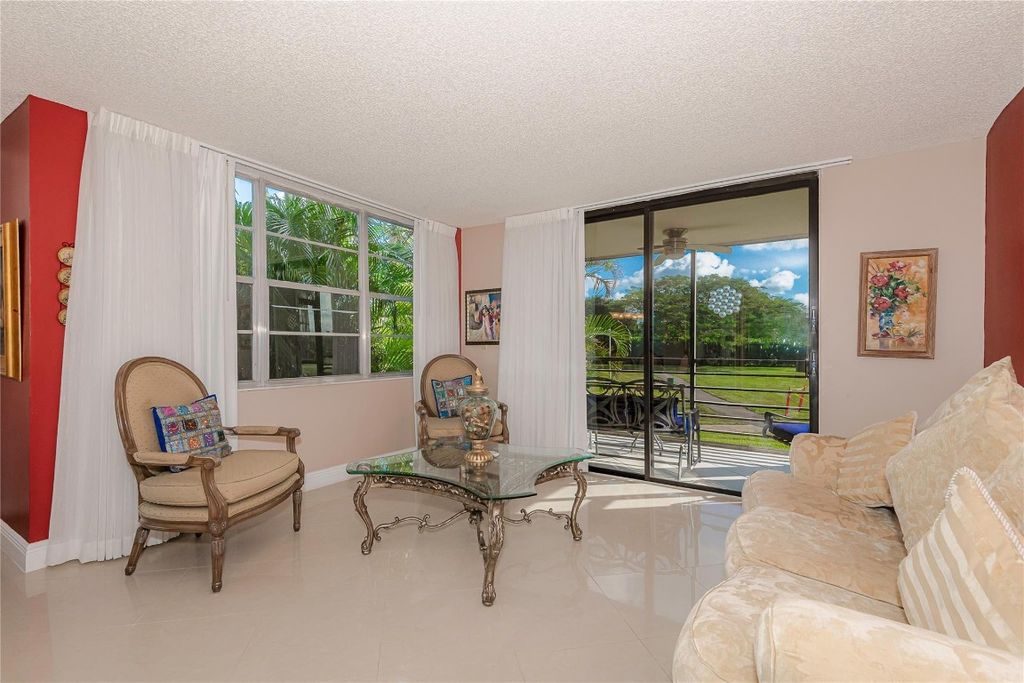Photo of 1200 Saint Charles Place #L-19, Pembroke Pines, FL 33026 (MLS # F10540353)