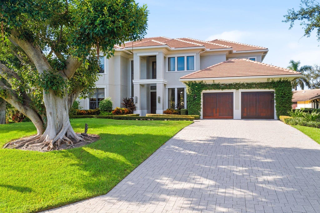 Photo of 1950 Portage Landing N, North Palm Beach, FL 33408 (MLS # B26086395)