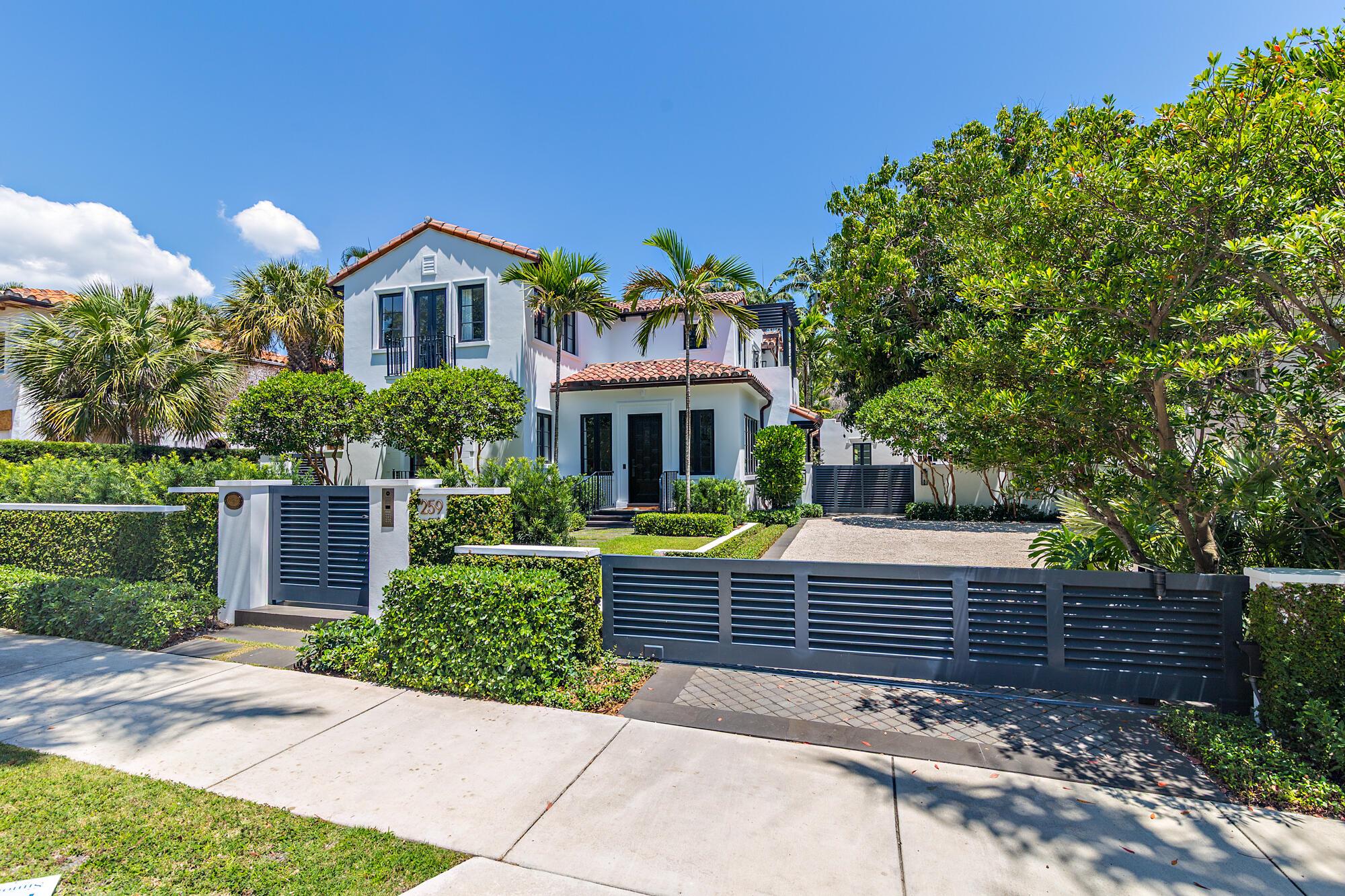 Tucked within the sought-after El Cid neighborhood, this stunning, double gated 4 bedroom, 4.5 bathroom Mediterranean-style estate with a private guesthouse is a crown jewel of timeless design. Created by Melhorn Architecture and featuring interiors by renowned designer Jeff Trotter, the home effortlessly blends historic charm with modern luxury. Step inside to exquisite herringbone hardwood floors and an abundance of natural light. The formal living room transitions seamlessly into an elegant dining area and a show-stopping media room (which could also serve as the fourth bedroom in the main house). The gourmet kitchen is a chef's dream, showcasing a Lacanche natural gas range and oven, honed marble countertops, and premium Sub-Zero appliances.