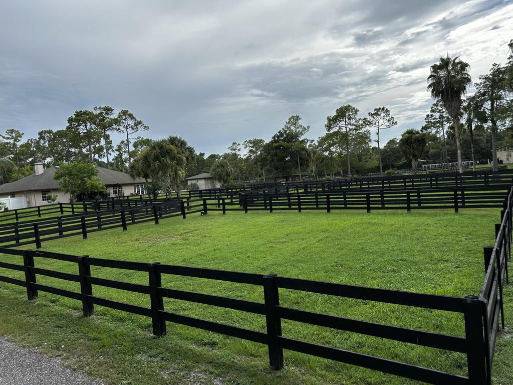 Photo of 13009 Collecting Canal Road, Loxahatchee Groves, FL 33470 (MLS # B26049646)