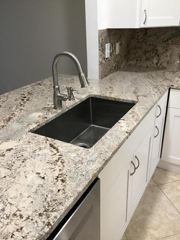 PALM GREENS AT VILLA DEL RAY CONDO II - Residential