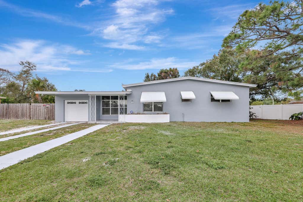 Photo of 225 NE Prima Vista Boulevard, Port Saint Lucie, FL 34983 (MLS # R10946723)