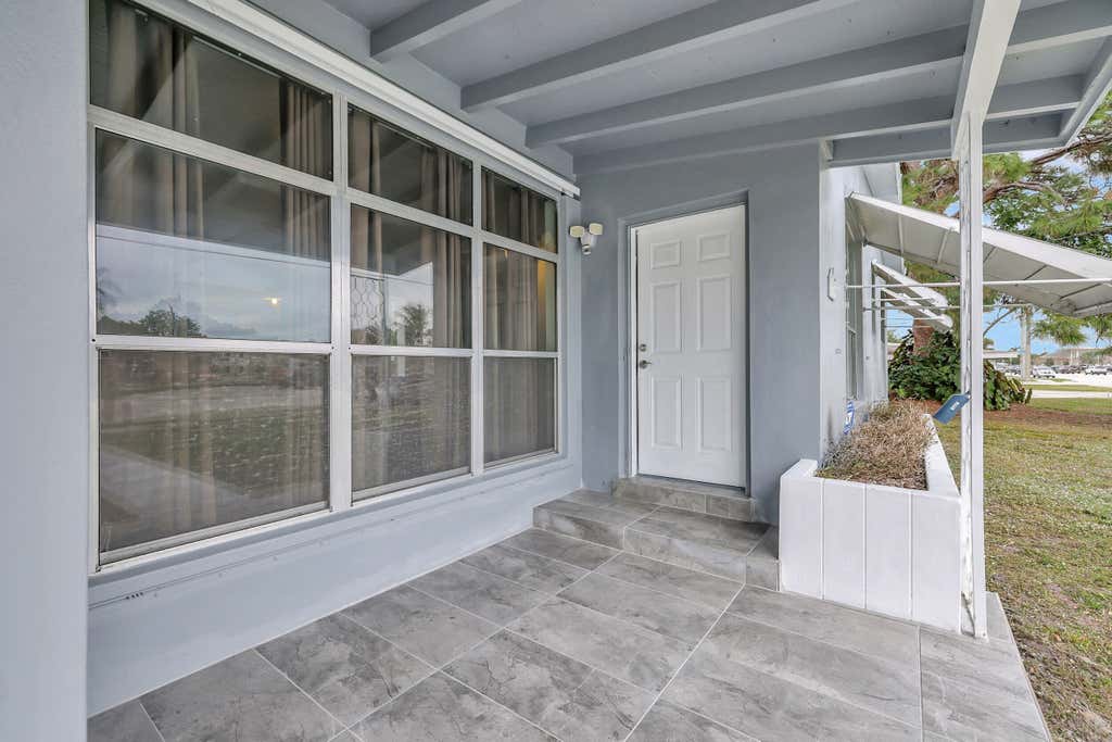 Photo of 225 NE Prima Vista Boulevard, Port Saint Lucie, FL 34983 (MLS # R10946723)