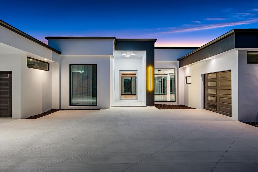 A rare fusion of privacy, precision, and architectural artistry, this minimalist modern masterpiece by Riverside Building & Design rests on over two acres along the North Fork of the Loxahatchee River. Designed to blend with its natural surroundings, it features clean lines, expansive glass, and seamless indoor-outdoor living with tranquil river views throughout. Highlights include a chef's kitchen with luxury appliances and custom cabinetry, a resort-style pool and spa, and a covered summer kitchen for effortless entertaining. A private dock with 16,000-lb lift offers direct access to the Intracoastal and Atlantic Ocean. With sleek design and timeless tranquility, 8309 SE Rivers Edge stands as one of Jupiter's most distinctive and private new waterfront estates.