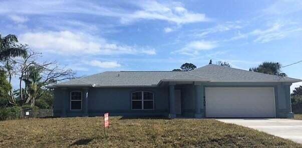 This Lakefront home features an open concept and split bedroom floor plan. 3 bedrooms, 2 baths and 2 car garage. Tile in main living areas.