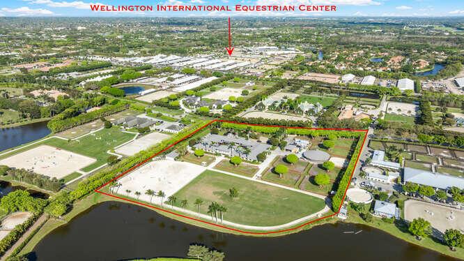 Short hack to the horse show with this top-level Grand Prix Farms Equestrian Estate with 38 stalls total. Plenty of staff housing along with a Grand Prix jump field, sand ring, covered 6 horse walker, and more.