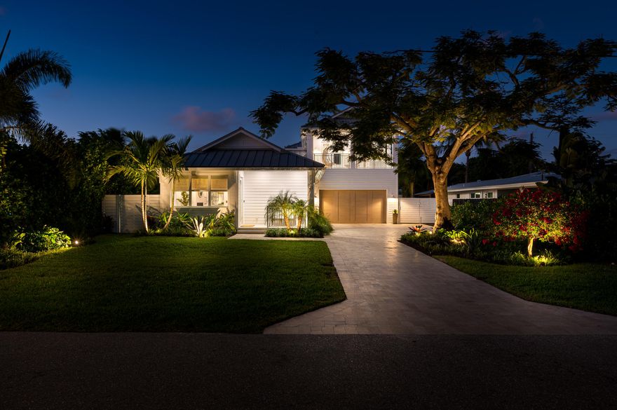 Discover a brand-new, exceptional 4-bedroom Key West style residence, situated on a serene tree-lined street just a short walk from the renowned Atlantic Ave. This fully furnished property comes complete with a street-legal golf cart. Every detail, from the quaint front porch to the unique finishes and secluded backyard, has been meticulously crafted with a designer's touch. Features include an outdoor shower, architecturally designed lighting, and a chef's kitchen  with natural gas. The retractable full-height glass doors lead to a summer kitchen overseeing a covered outdoor dining space and a luxurious pool. The fourth bedroom, if desired, can be divided to create a fifth bedroom with a private bath and its own balcony. Also multiple refrigerators, FH generator and putting green.