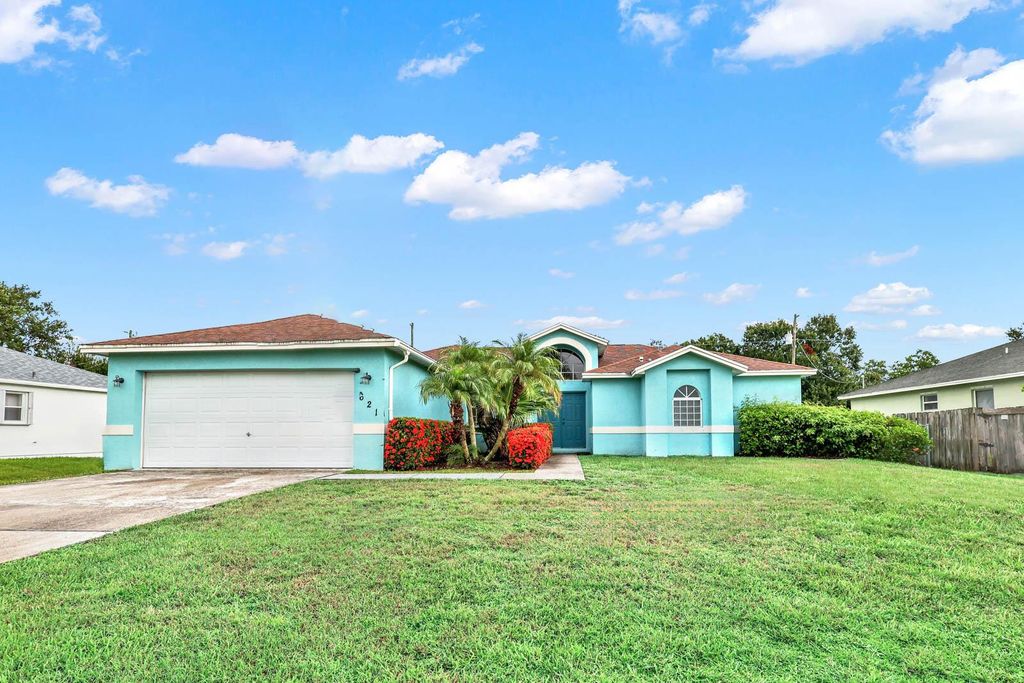 Photo of 621 SW Aster Road, Port St Lucie, FL 34953 (MLS # R10908424)