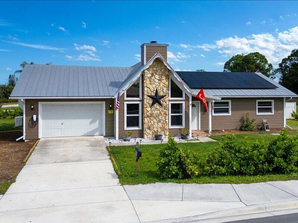 Photo of 1297 SE Floresta Drive, Port Saint Lucie, FL 34983 (MLS # R11132987)