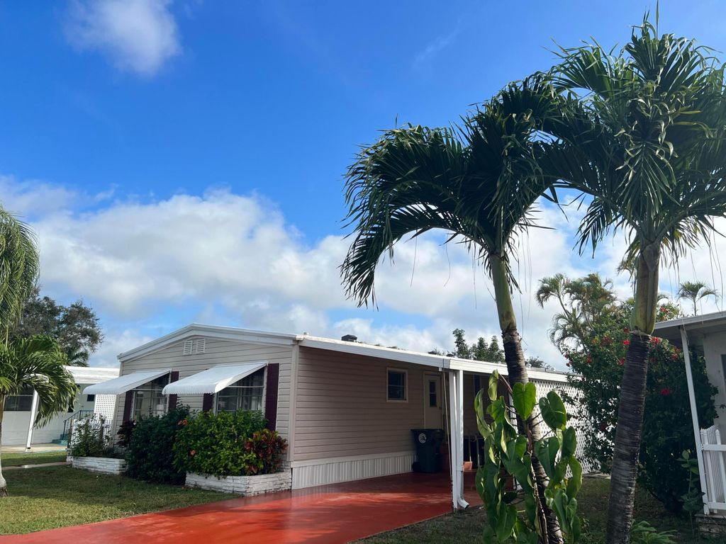 Photo of 6750 NW 45th Way #R-02, Coconut Creek, FL 33073 (MLS # R10966957)