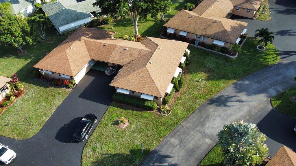 Photo of 718 Whippoorwill Lane, Delray Beach, FL 33445 (MLS # R11147654)