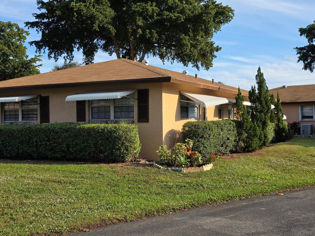 Photo of 718 Whippoorwill Lane, Delray Beach, FL 33445 (MLS # R11147654)