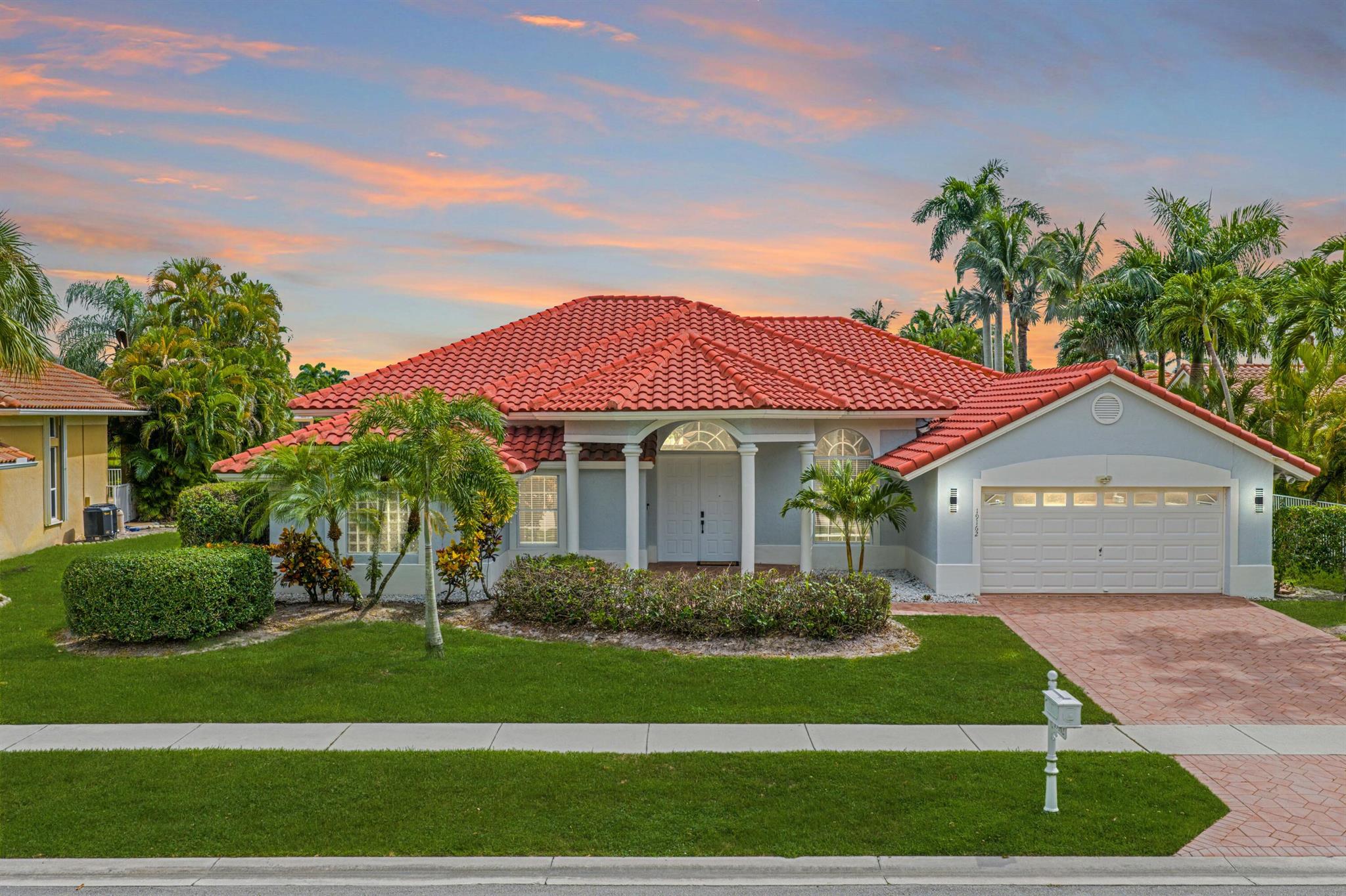 Designer renovated 4BR/3BA waterfront home in prestigious Boca Isles North with new 2020 roof and new ACs. The home has an open concept layout, stunning new kitchen, abundant natural light, spa style baths, and views for days! Large bedrooms with a split floor plan, and 14ft ceilings make this home feel grand. Head outdoors to a covered lanai and yard big enough to add the pool of your dreams. Located in the highly sought after Sunrise Park school district, with resort-style amenities: renovated clubhouse, gym, heated pool, tennis/pickleball & billiards. Experience the best of Boca luxury living!