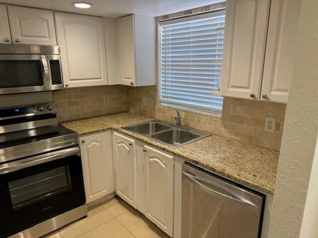 Photo of 10290 N Military 4a Trail #4a, Palm Beach Gardens, FL 33410 (MLS # R11098367)