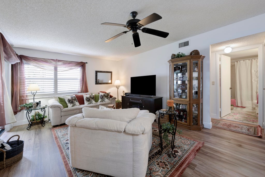 Photo of 7626 Tahiti Lane #104, Lake Worth, FL 33467 (MLS # R11099041)