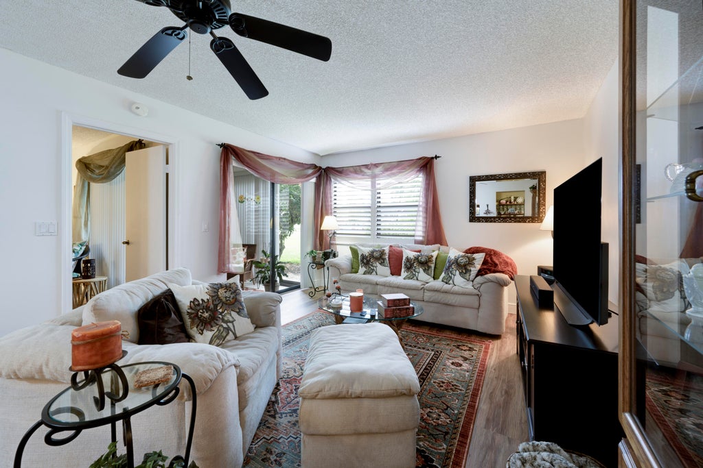 Photo of 7626 Tahiti Lane #104, Lake Worth, FL 33467 (MLS # R11099041)