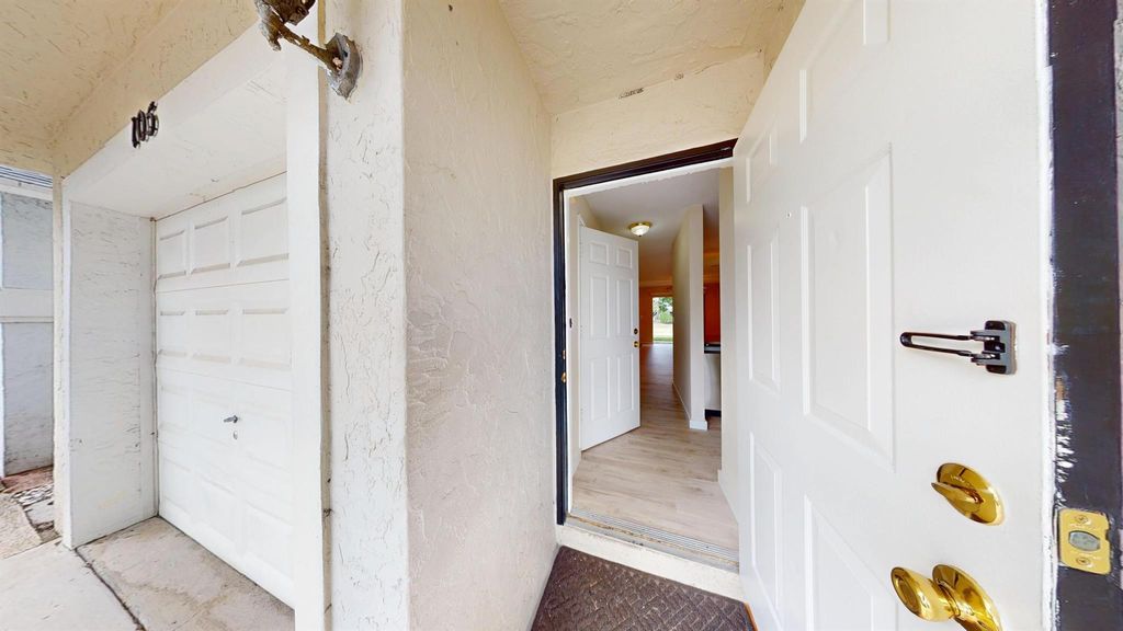 Photo of 105 Pheasant Run Boulevard, West Palm Beach, FL 33415 (MLS # R11086675)