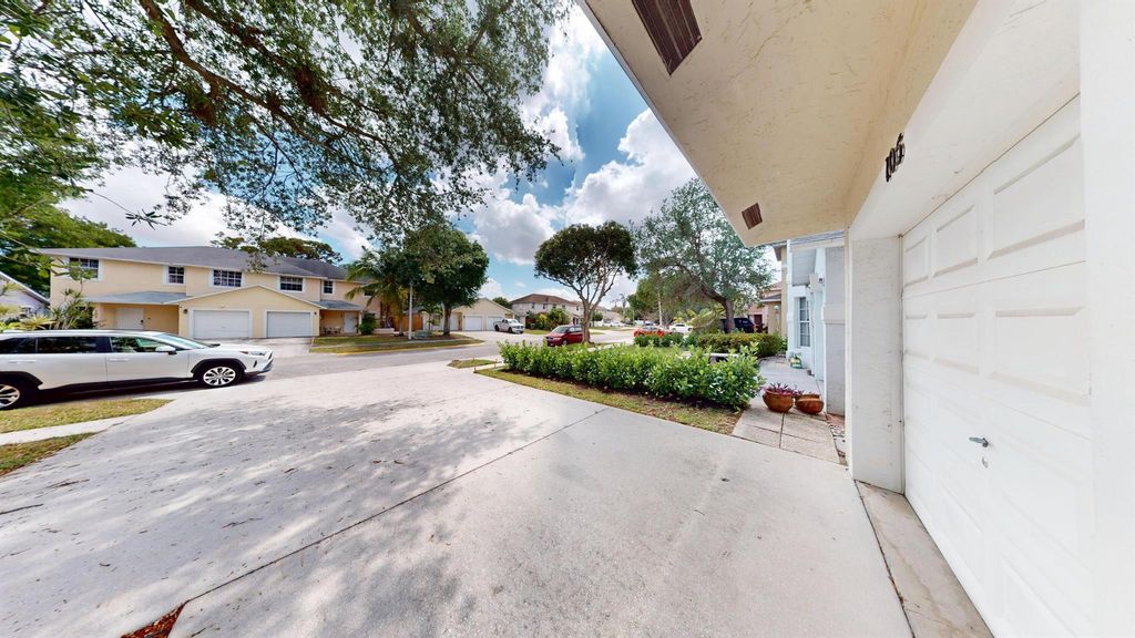 Photo of 105 Pheasant Run Boulevard, West Palm Beach, FL 33415 (MLS # R11086675)
