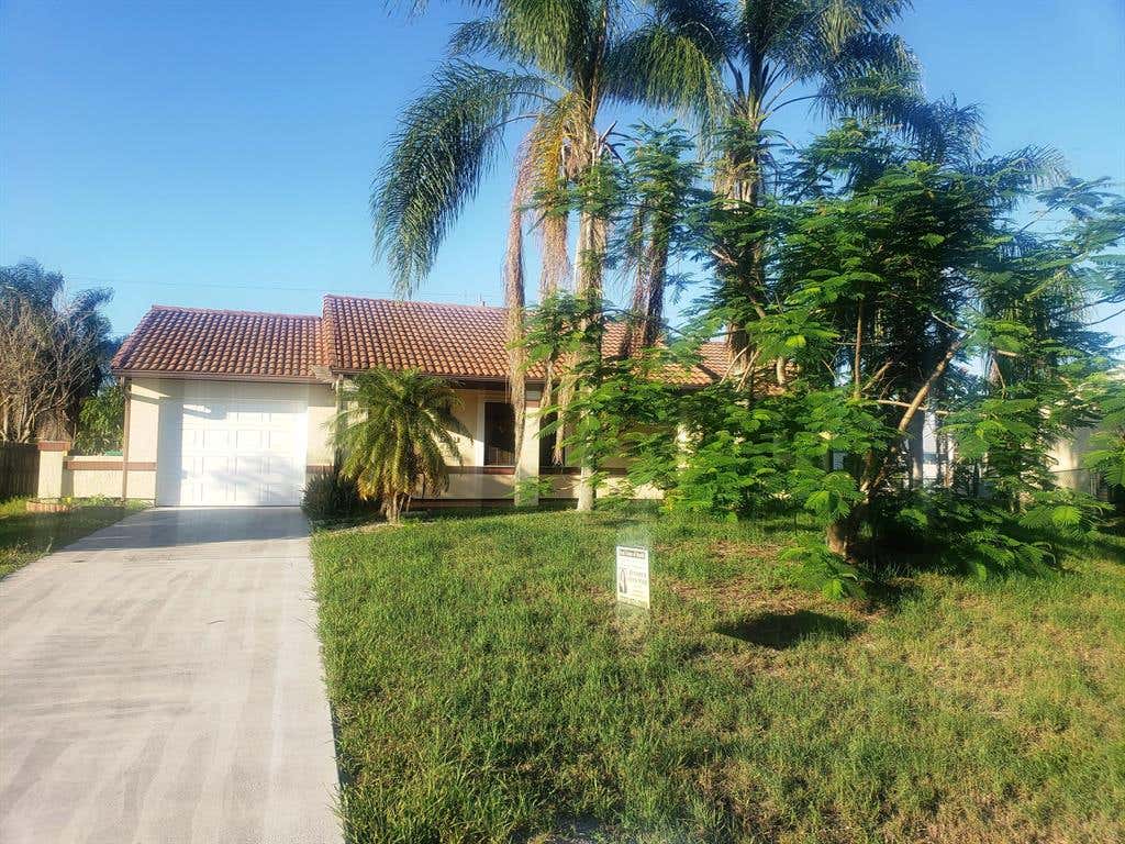 Photo of 541 SW Dalton Circle, Port Saint Lucie, FL 34953 (MLS # R10723047)