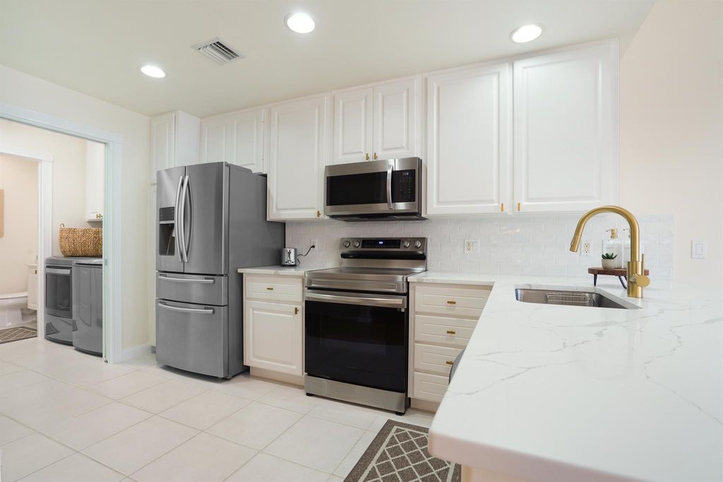 Photo of 4111 Community Drive, Jupiter, FL 33458 (MLS # R10972243)