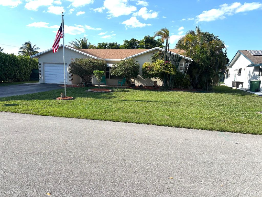 Photo of 9603 NW 73rd Street, Tamarac, FL 33321 (MLS # B26023173)