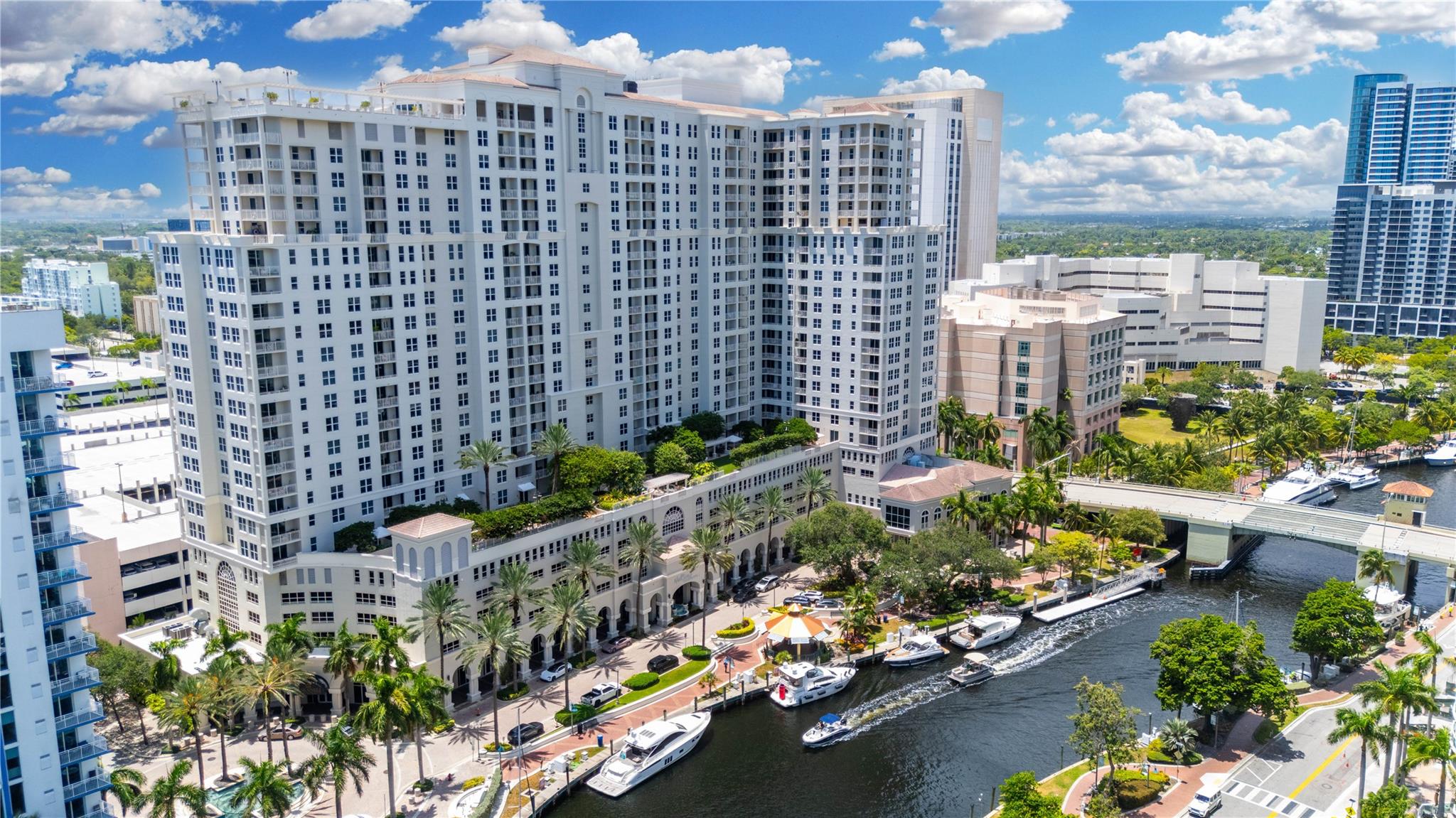 Views forever from the 19th floor. This 2 bed one bath condo features 11' high ceilings (one of only 2 floors that do). The open plan kitchen and dining area make for easy entertaining and relaxing. The private balcony offers views to the South of the port, the airport and the skylines toward Miami. New washer/dryer/fridge and AC! NuRiver Landings was built with luxury in mind and features an indoor racquetball court, a basketball court and a full gym as well as separate male and female saunas and steam rooms. The rooftop pool and huge clubroom provide relaxation amid splendid views of the New River, Downtown and the Ocean. There is 24 hours security and access control. The Riverwalk and fine dining of Las Olas Blvd and surrounds are mere minutes away. Don't let this gem slip away!