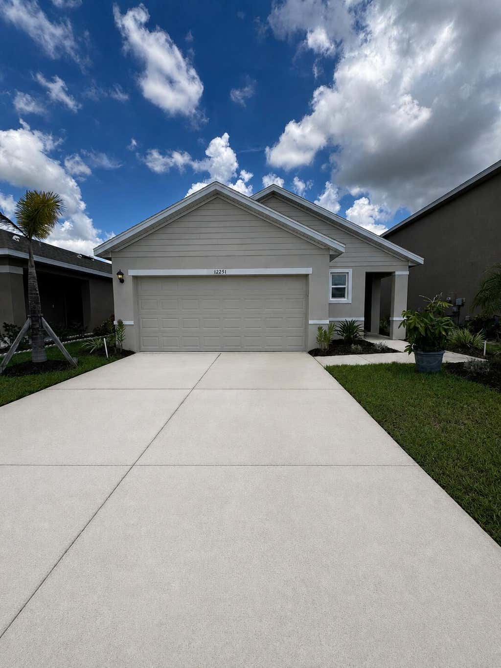 Photo of 12251 SW NETTUNO Way, Port Saint Lucie, FL 34987 (MLS # B26068069)