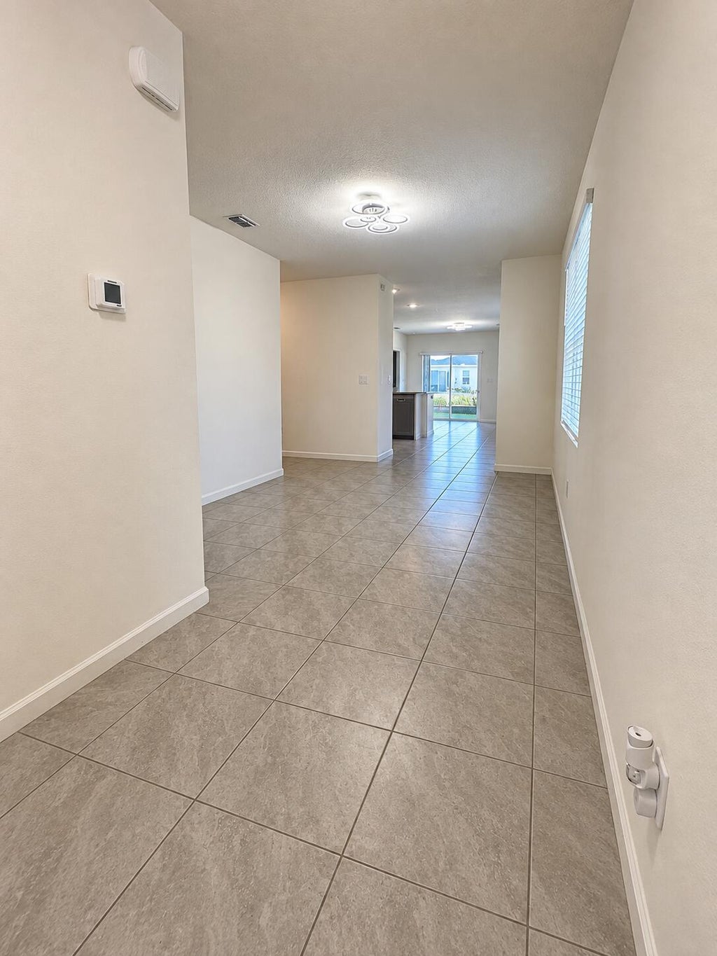 Photo of 12251 SW NETTUNO Way, Port Saint Lucie, FL 34987 (MLS # B26068069)