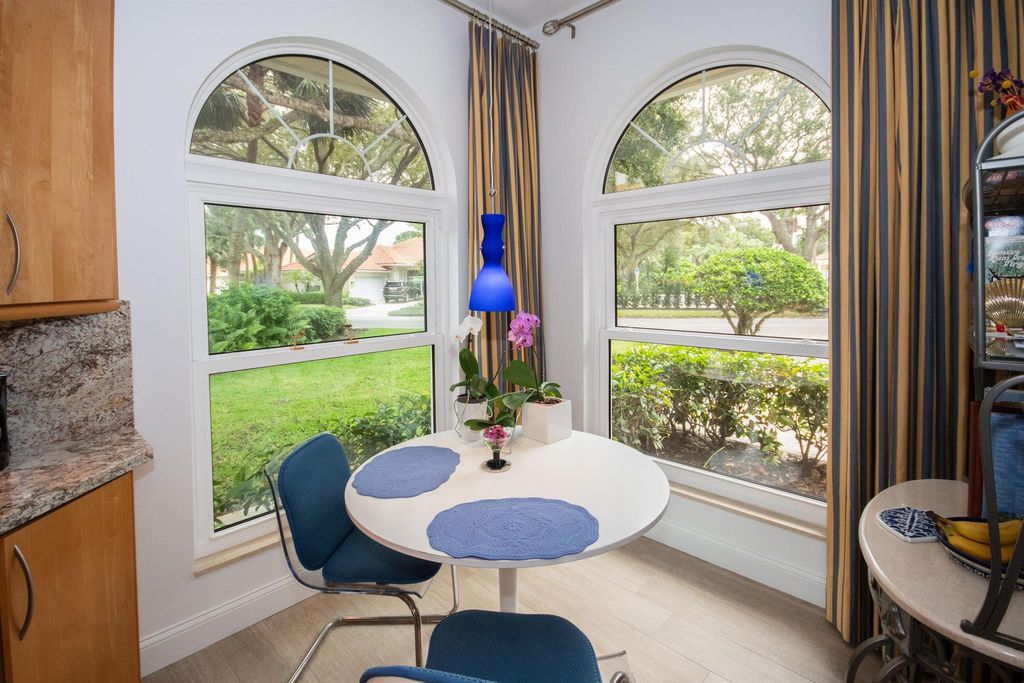 Photo of 142 E Tall Oaks Circle, Palm Beach Gardens, FL 33410 (MLS # R10948587)