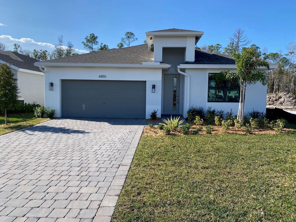 Photo of 6850 SE Park Trace Drive, Stuart, FL 34997 (MLS # R11047363)