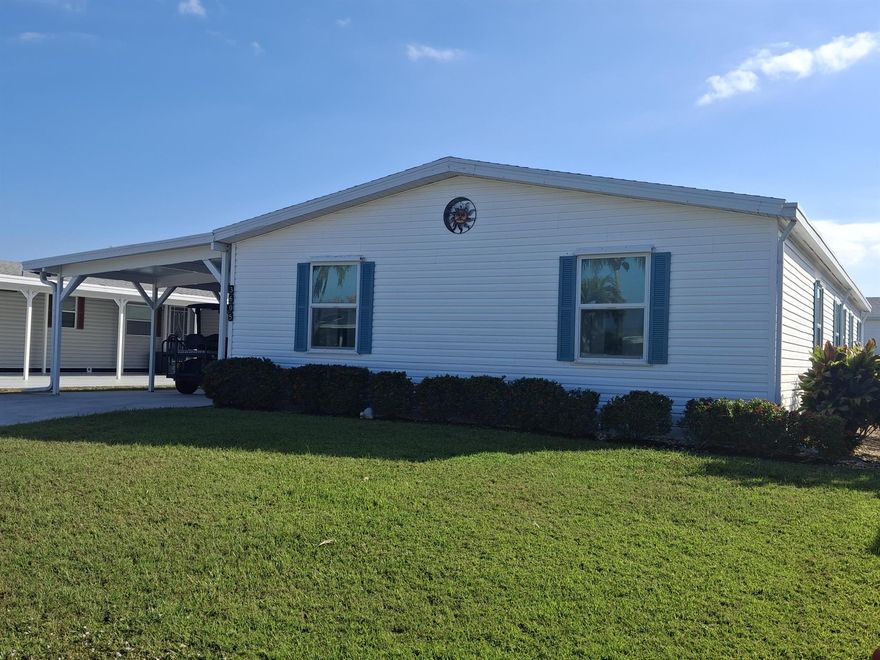 RARE Land-owned 3 bedroom, 2 bath home. Immaculate and move-in ready! Located just steps from a clubhouse, pool, on-site restaurant, golf shop & exercise room. This home offers exceptional convenience and value. Recent updates include a 2020 roof, impact windows, new LVP flooring (2024), new refrigerator (2024), and new toilets and vanities (2024). The dishwasher was replaced in 2025 and fridge (2024). The open, spacious layout includes French doors, a formal dining room, and a separate dinette off the kitchen. Enjoy the Florida lifestyle on the large lanai or the open patio. Perfect for grilling and entertaining. A land-owned 3-bedroom home in such close proximity to major amenities is truly hard to find--and will not last long! Come see how affordable Savanna Club is!