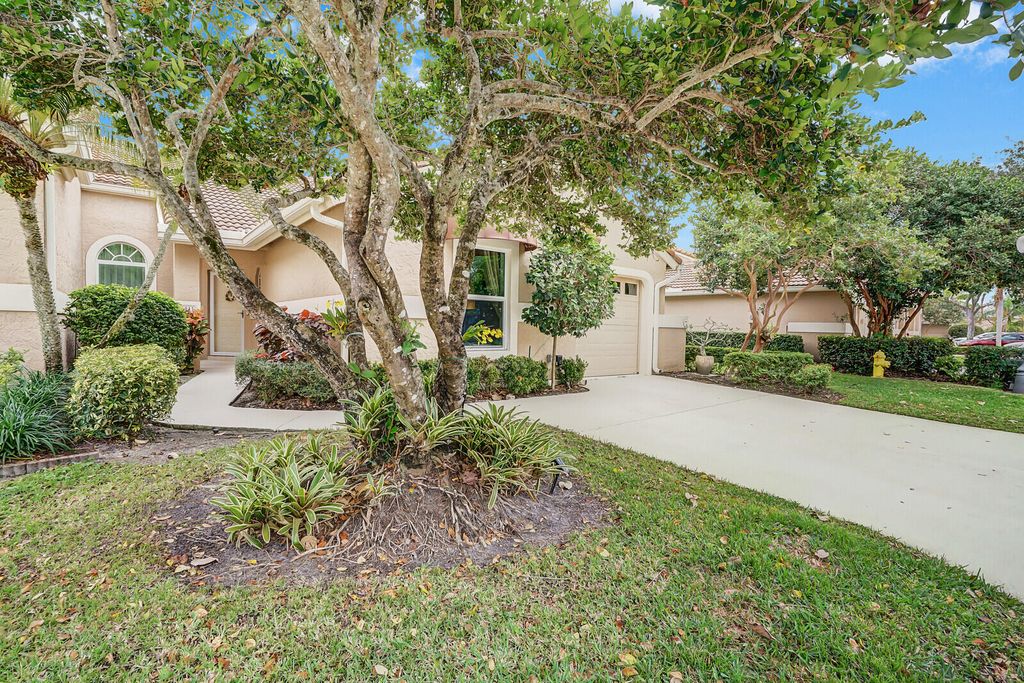 Photo of 104 Sabal Palm Lane, Palm Beach Gardens, FL 33418 (MLS # R10960062)