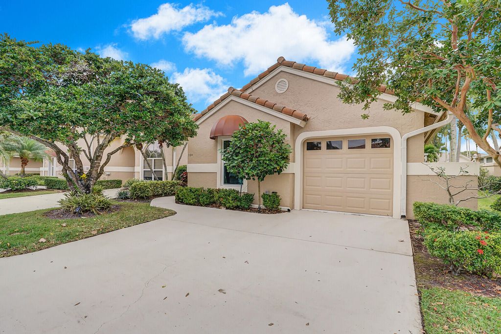 Photo of 104 Sabal Palm Lane, Palm Beach Gardens, FL 33418 (MLS # R10960062)