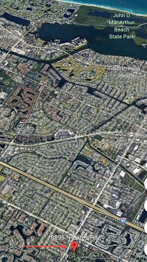 Photo of 8895 N Bates Road, Palm Beach Gardens, FL 33418 (MLS # R11150027)