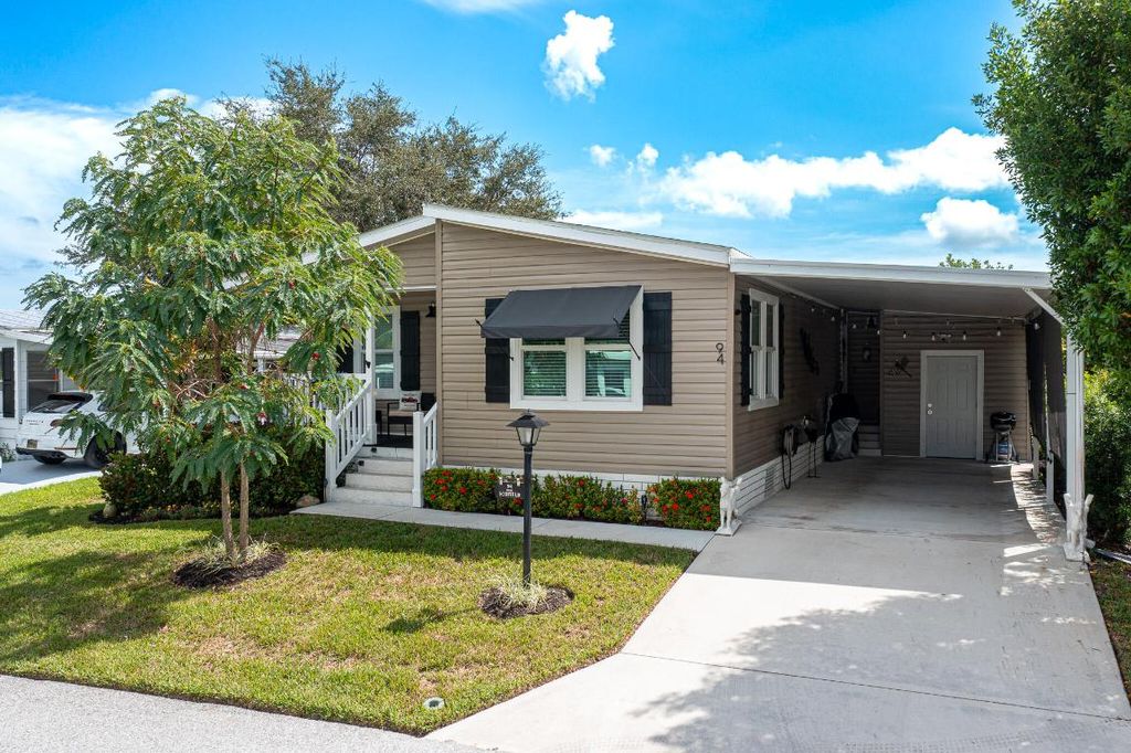Photo of 94 N North Warner Drive, Jensen Beach, FL 34957 (MLS # R11128318)