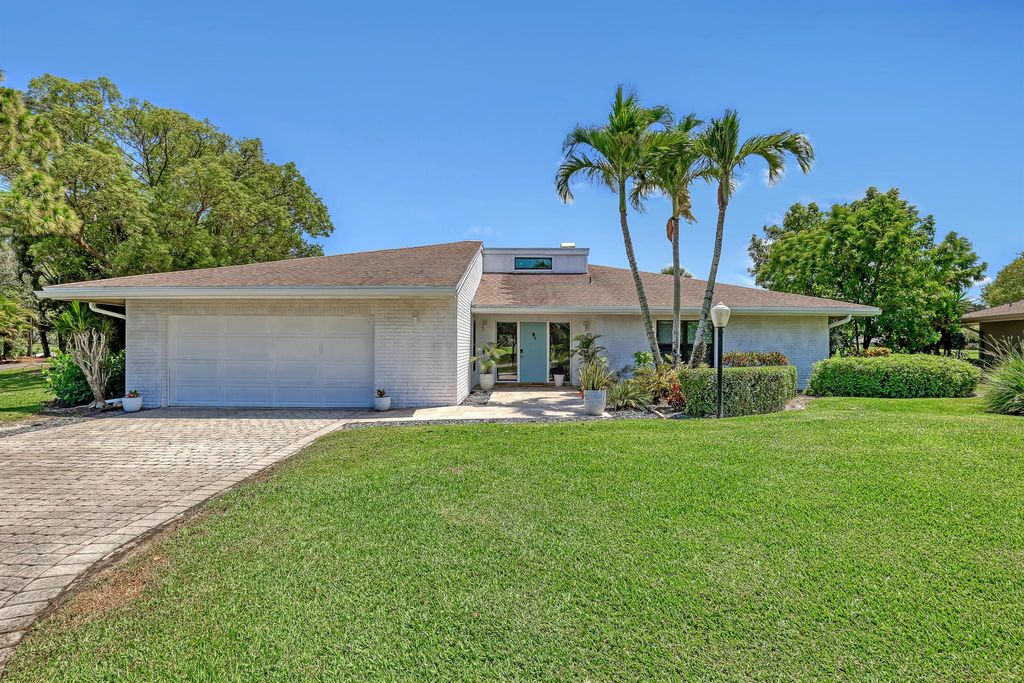 Photo of 13856 Sand Crane Drive, Palm Beach Gardens, FL 33418 (MLS # R11091174)