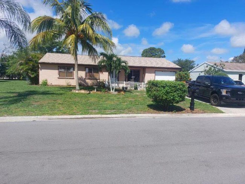 Photo of 1752 SE Burgundy Lane, Port St Lucie, FL 34953 (MLS # R10902464)