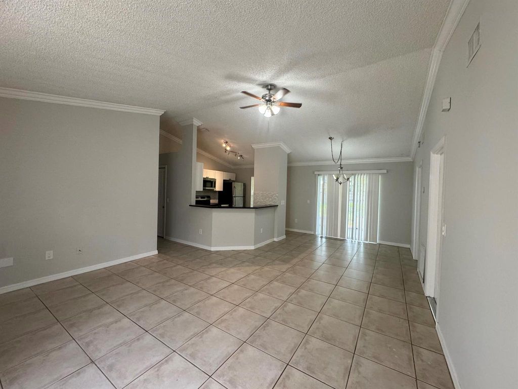 Photo of 1632 SW Bascom Avenue, Port Saint Lucie, FL 34953 (MLS # R10992370)