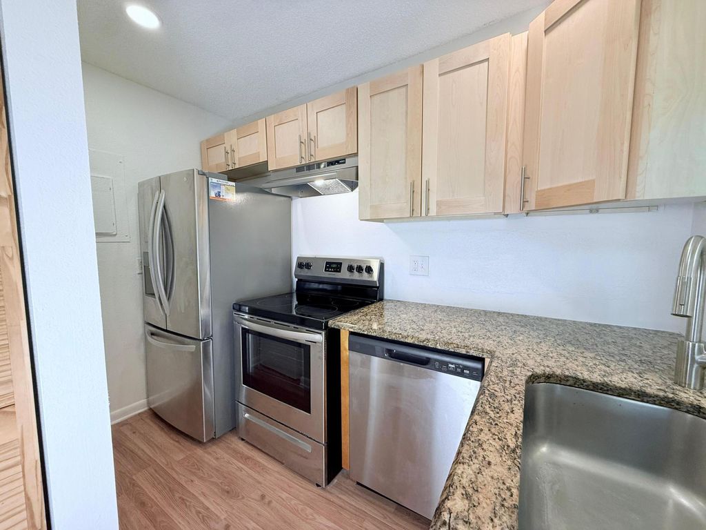 Photo of 603 Sea Pine Way #E3, Greenacres, FL 33415 (MLS # R11111457)